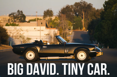Big David. Tiny Car.